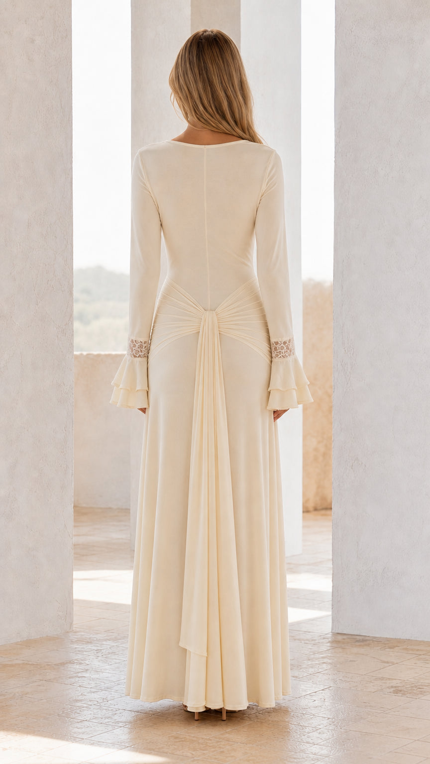 Back view of ivory maxi dress with drape detail