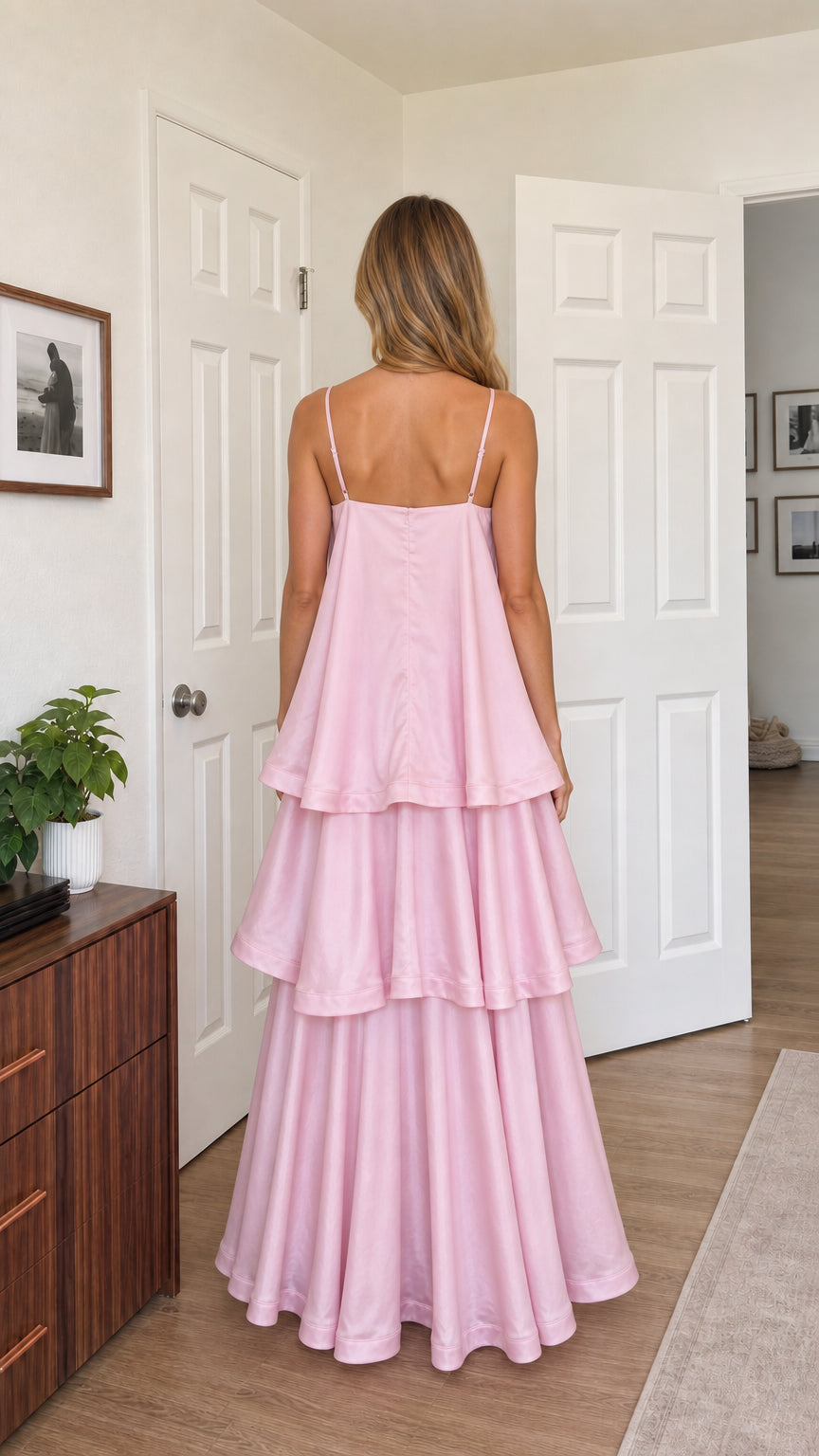 Back view of model in pink tiered maxi dress