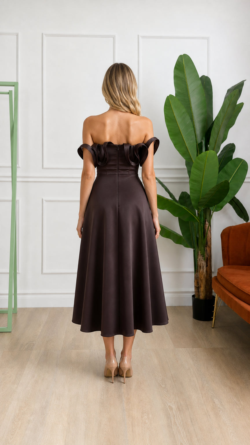 Back view of woman wearing brown midi dress