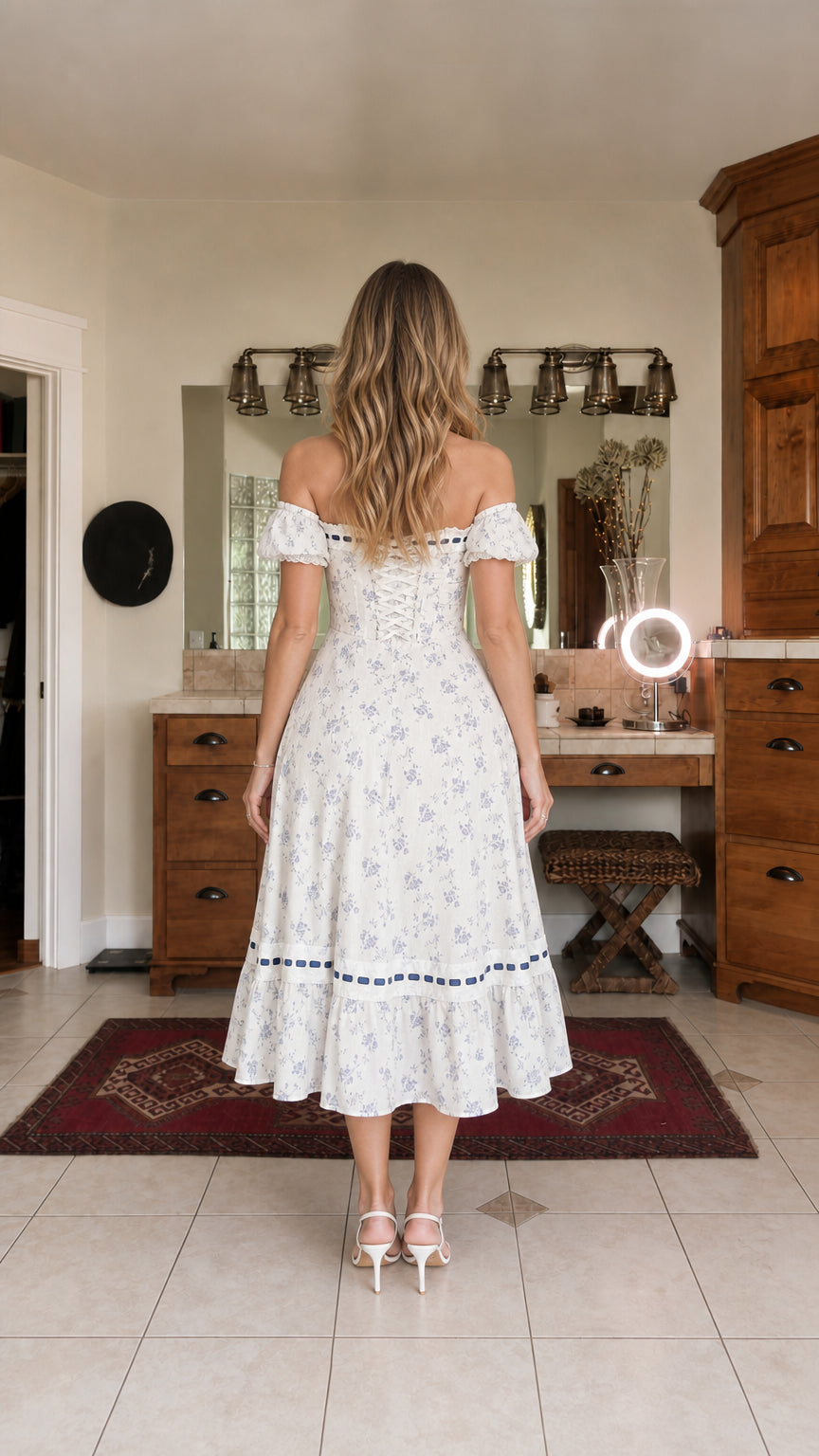 Back view of white floral midi dress