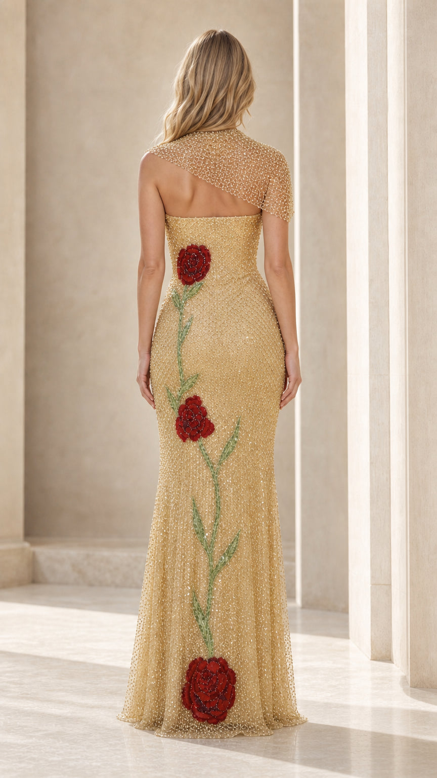 Back view showing asymmetric drape of gold evening gown