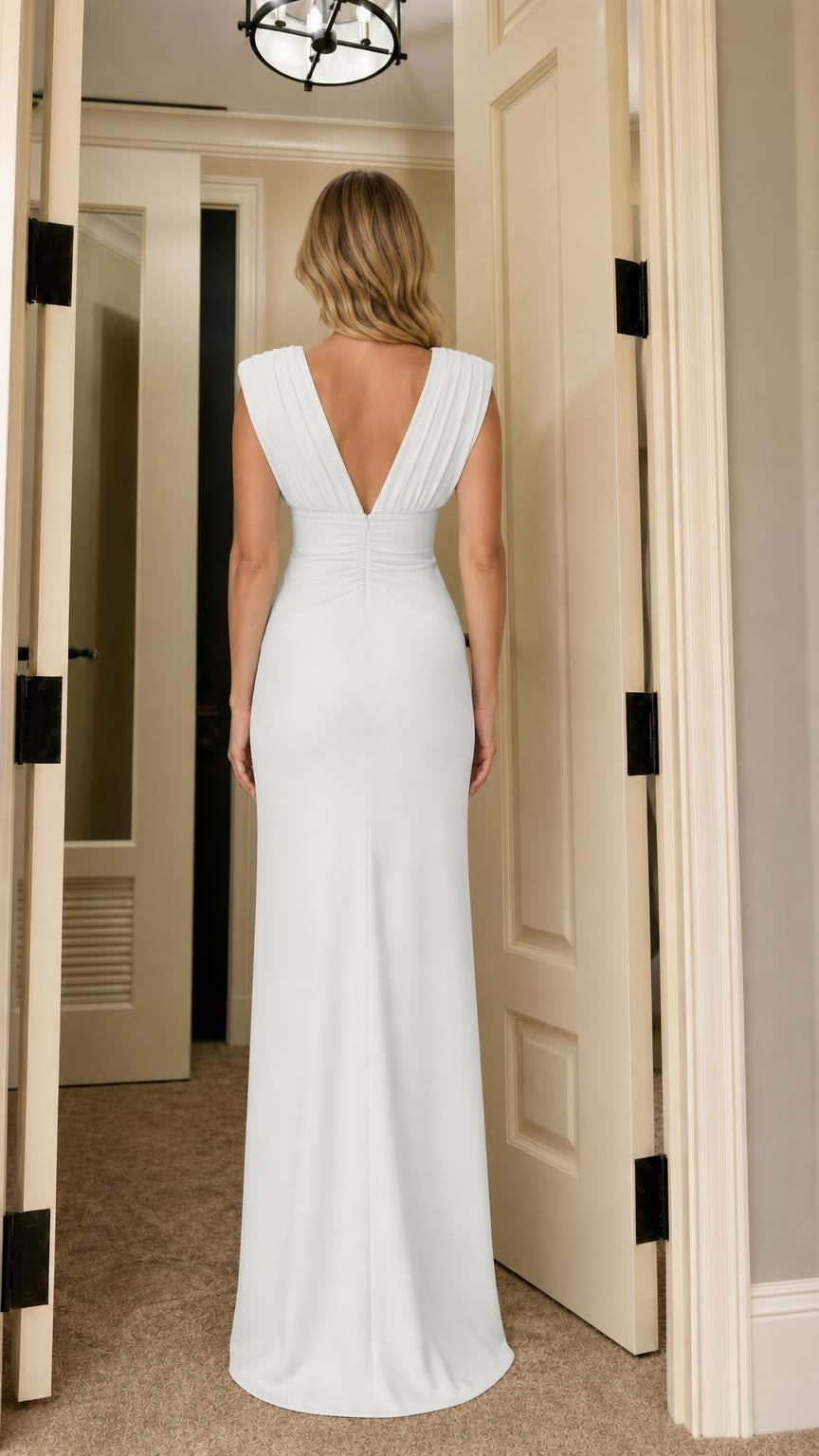 Back view of woman wearing white maxi evening dress