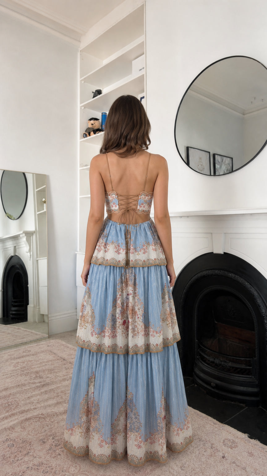 Sky blue floral maxi dress showing the open back and tiered skirt