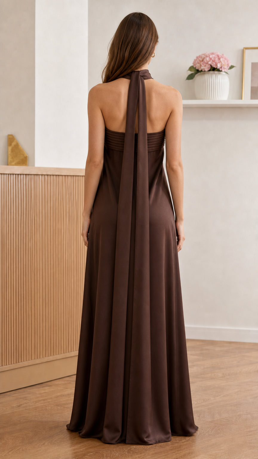 Back view of brown maxi dress showing halter scarf detail