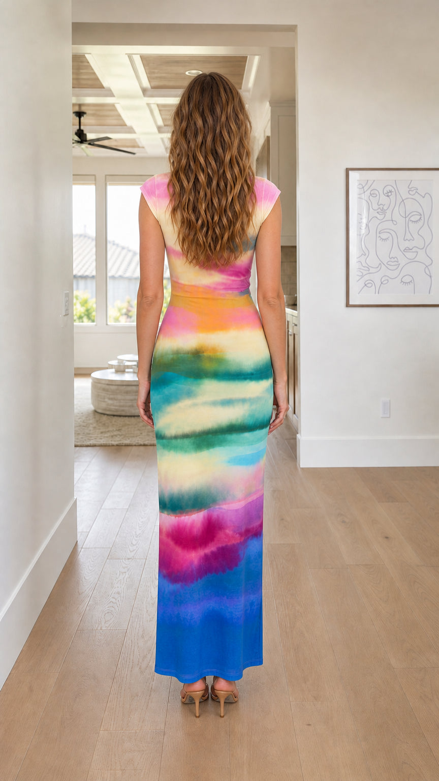 Back view of woman in Rainbow tie-dye maxi dress
