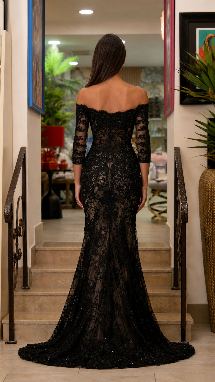 Back view of black lace evening gown with sweep train