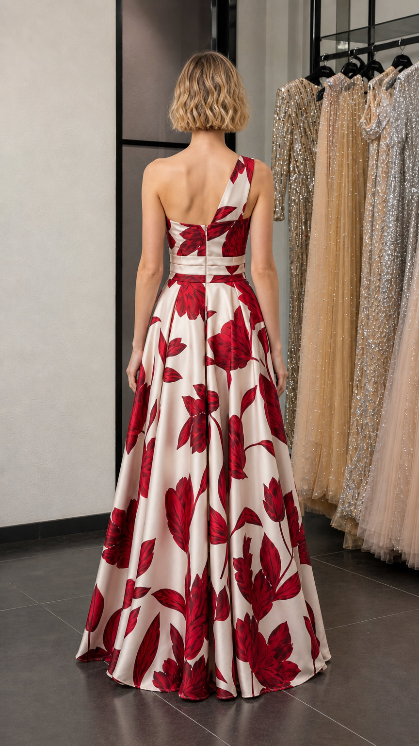 Back view showcasing the flowing skirt and one-shoulder strap