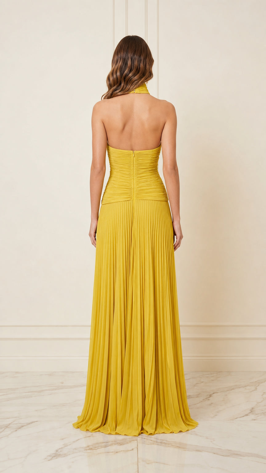 Back view of yellow pleated halter evening dress