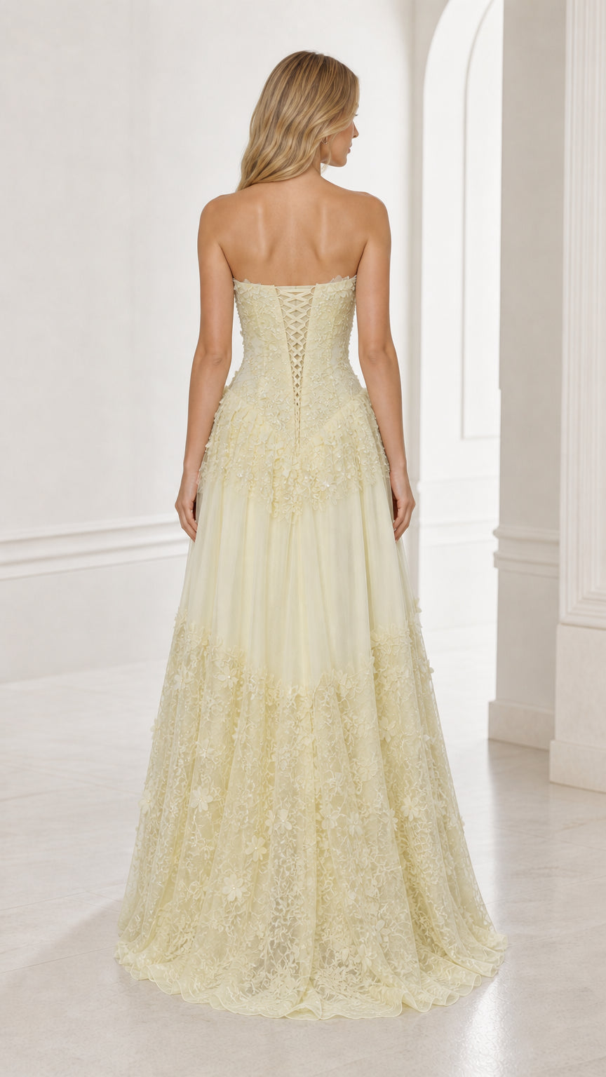 Back view of yellow strapless floral applique ball gown showing corset lacing