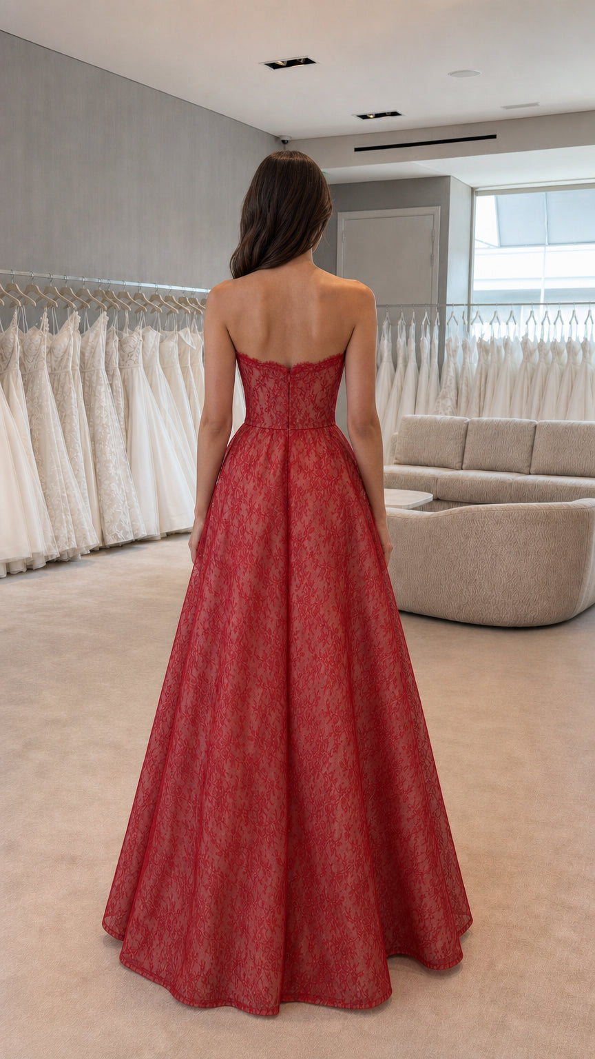 Back view of red strapless lace evening gown