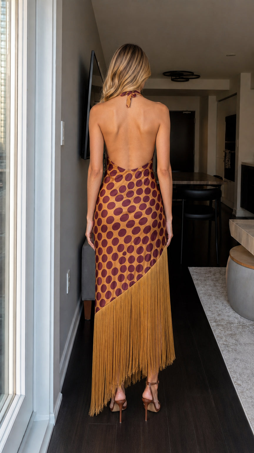 Back view showcasing open-back design of the maxi dress