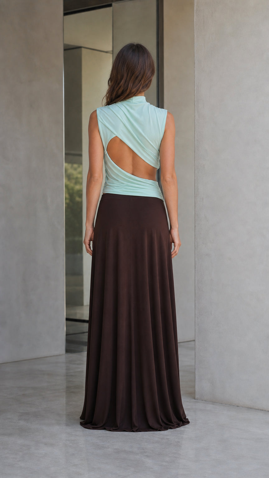 Back view highlighting open-back cutout on mint top