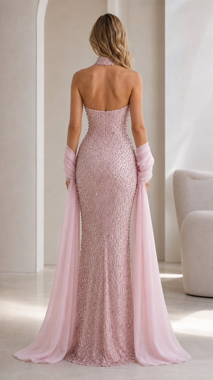 Back view of pink sequin evening gown showing strapless design