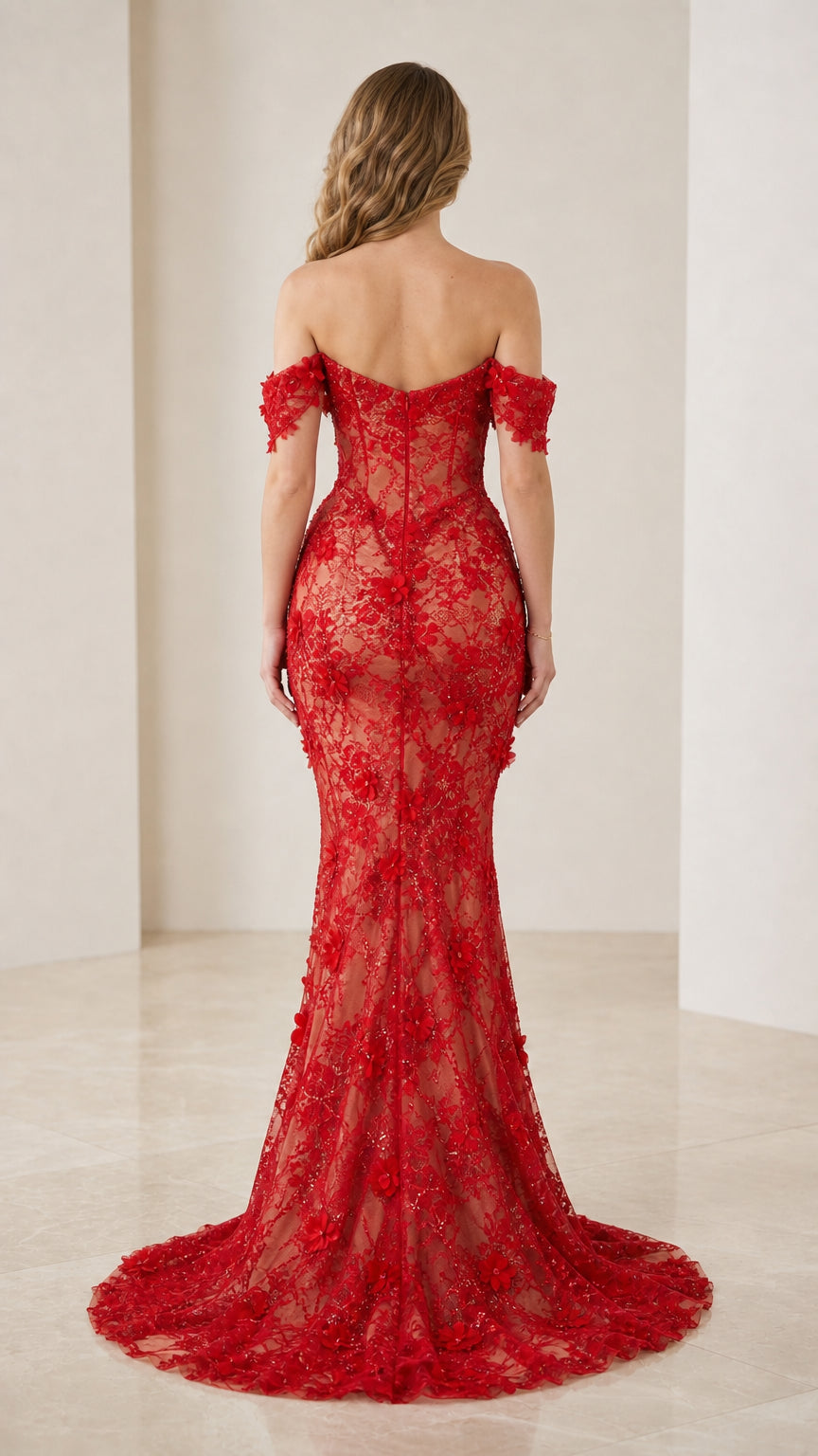 Back view showing sweep train of red lace gown
