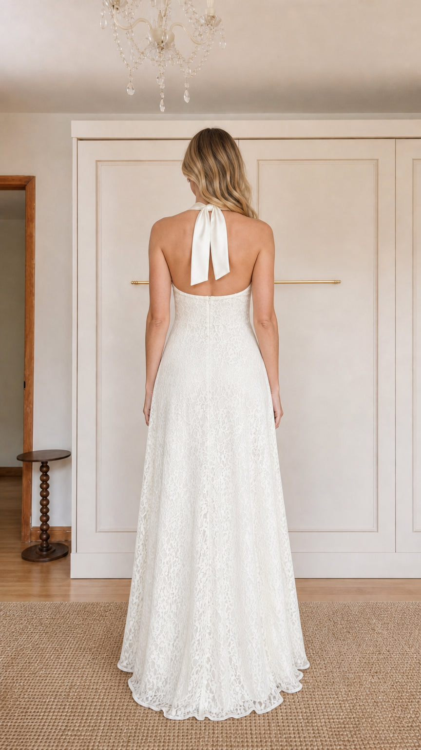 Back view of model showing self-tie bow on White lace dress