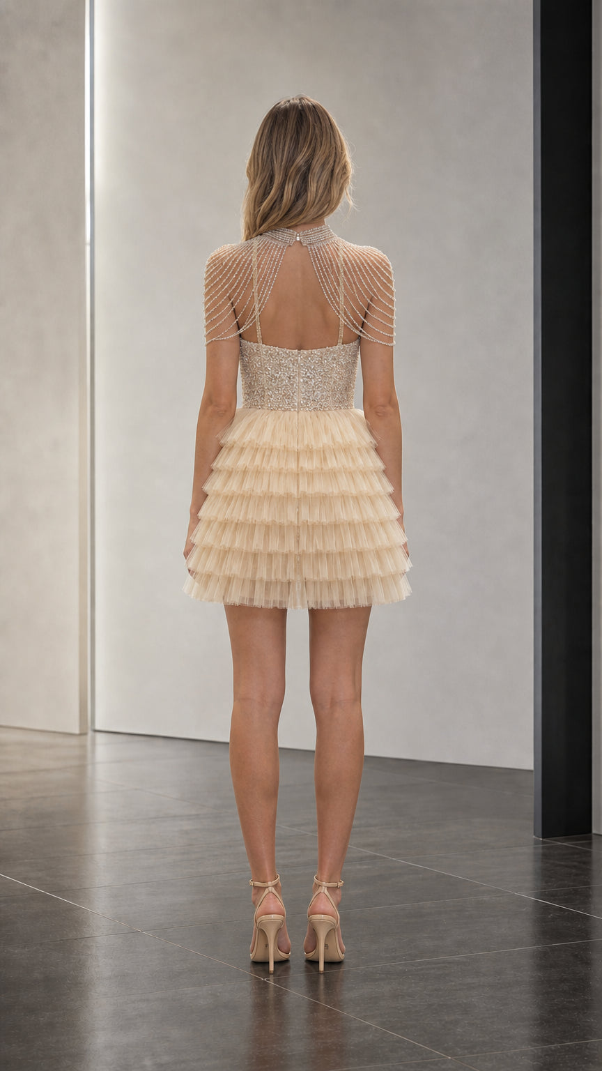Back view showcasing keyhole back and beaded shoulder detail