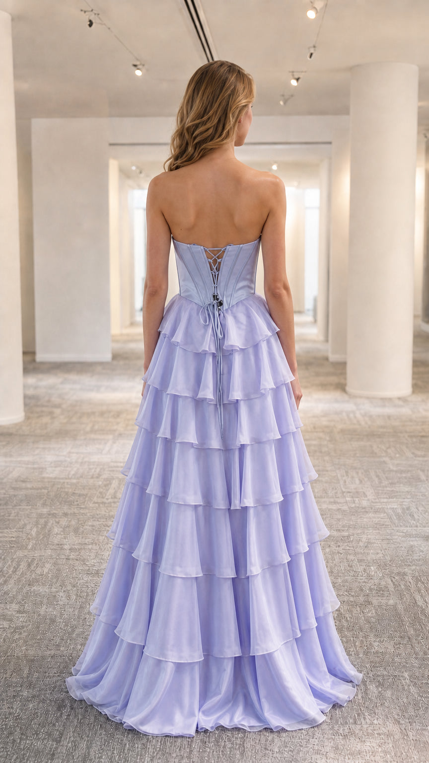 Model wearing lavender evening gown back view showing lace-up closure