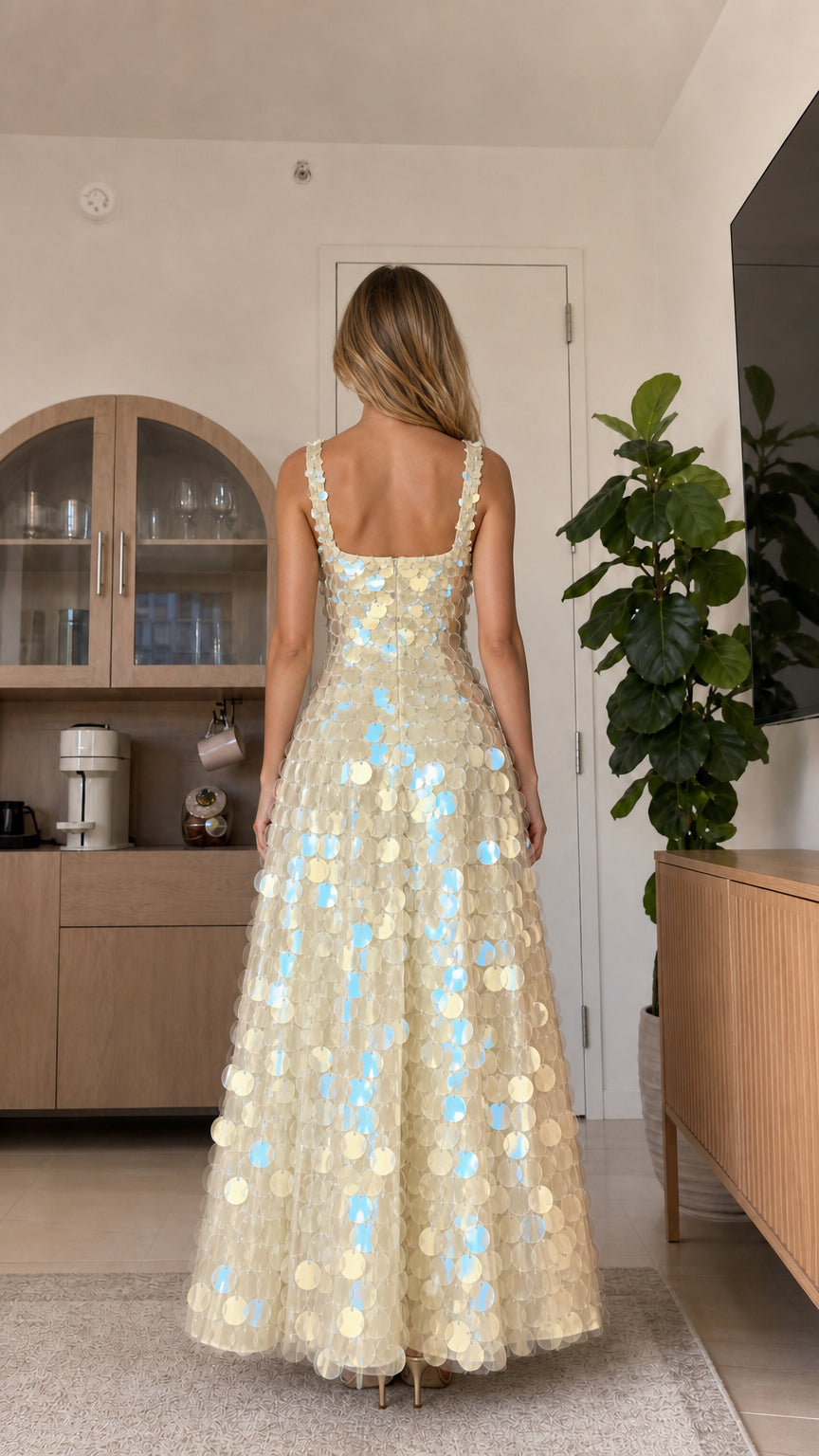 Back view of champagne sequin maxi dress
