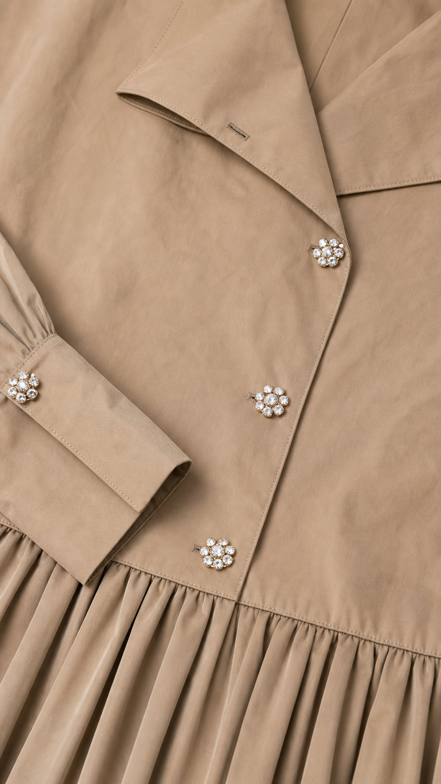Close-up of collar, crystal buttons, and sleeve cuff