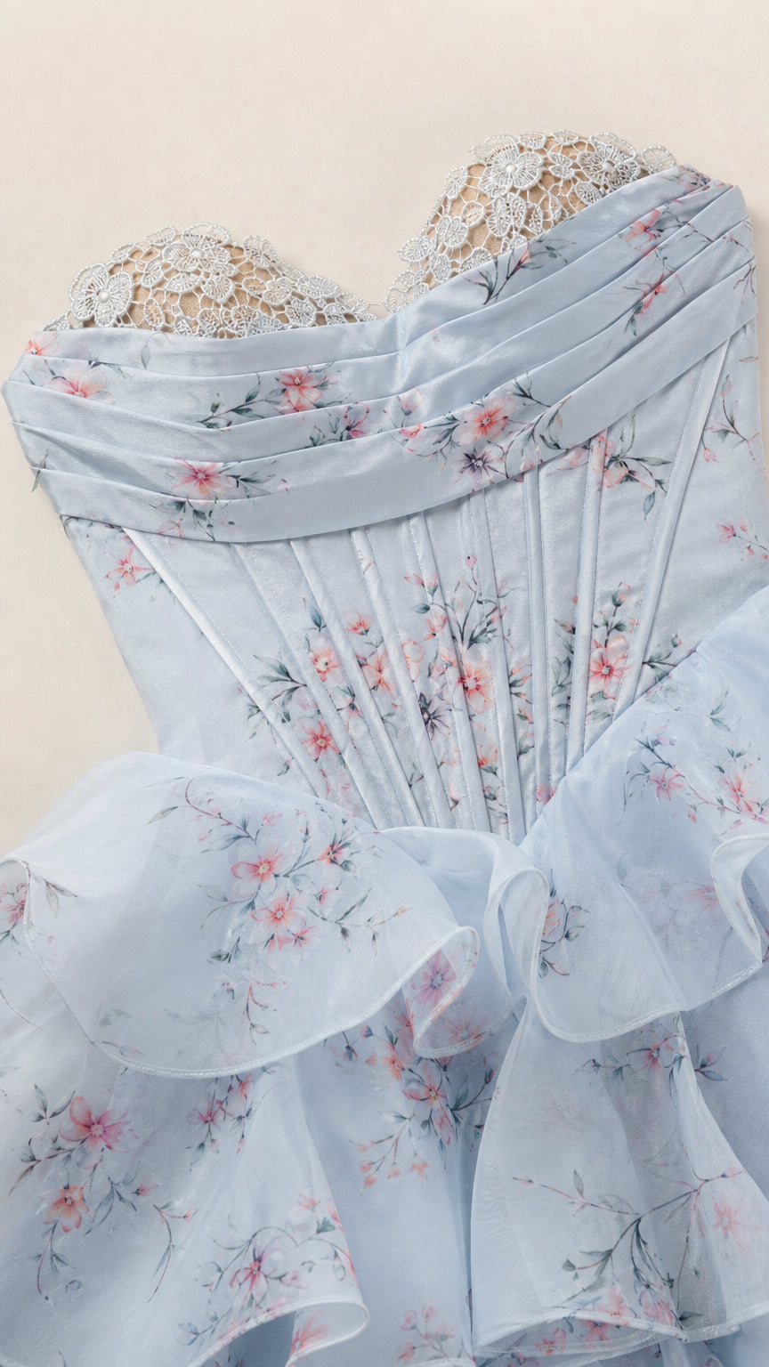 Close-up detail of lace-trimmed sweetheart neckline and boned corset bodice
