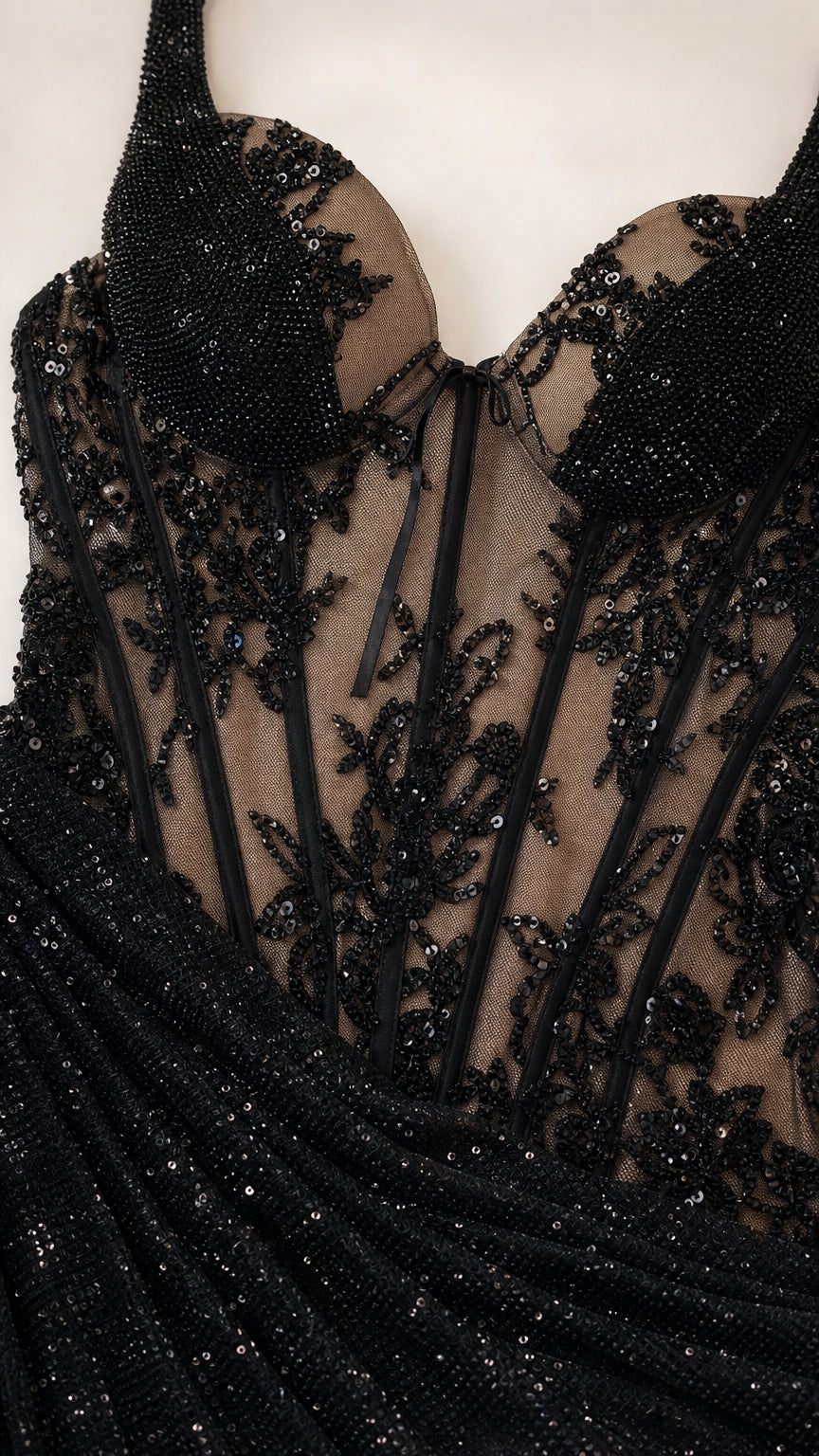 Close-up detail of beaded sheer corset bodice