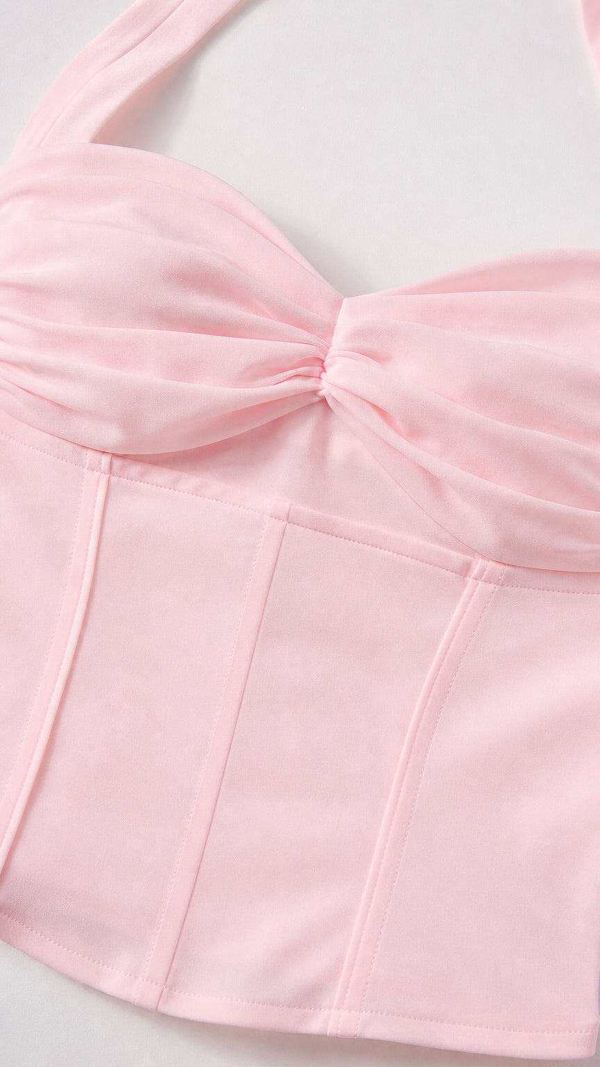 Close up of pink corset top bodice and twist detail