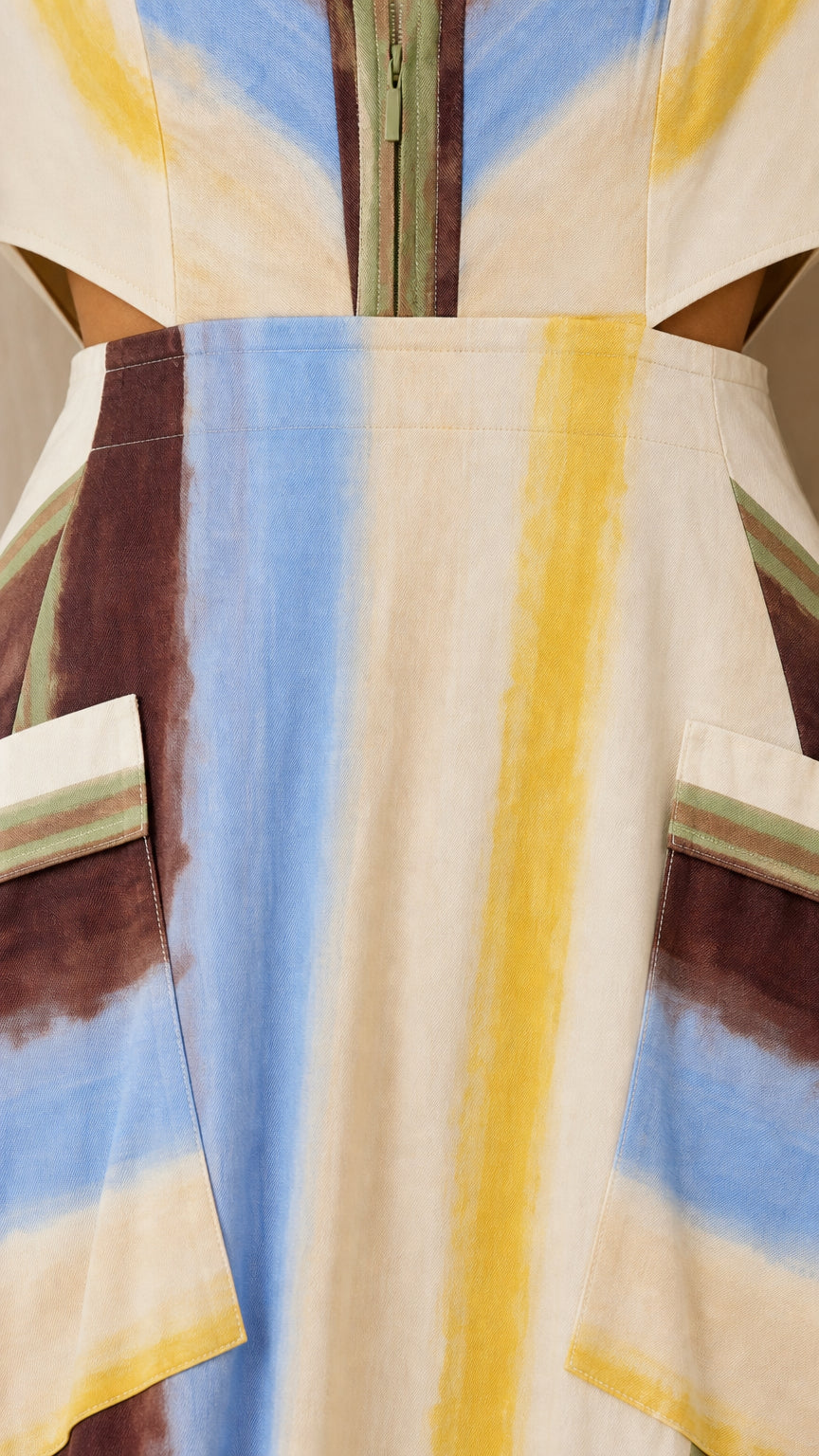 Close-up of waist cutouts and utility pockets on striped dress