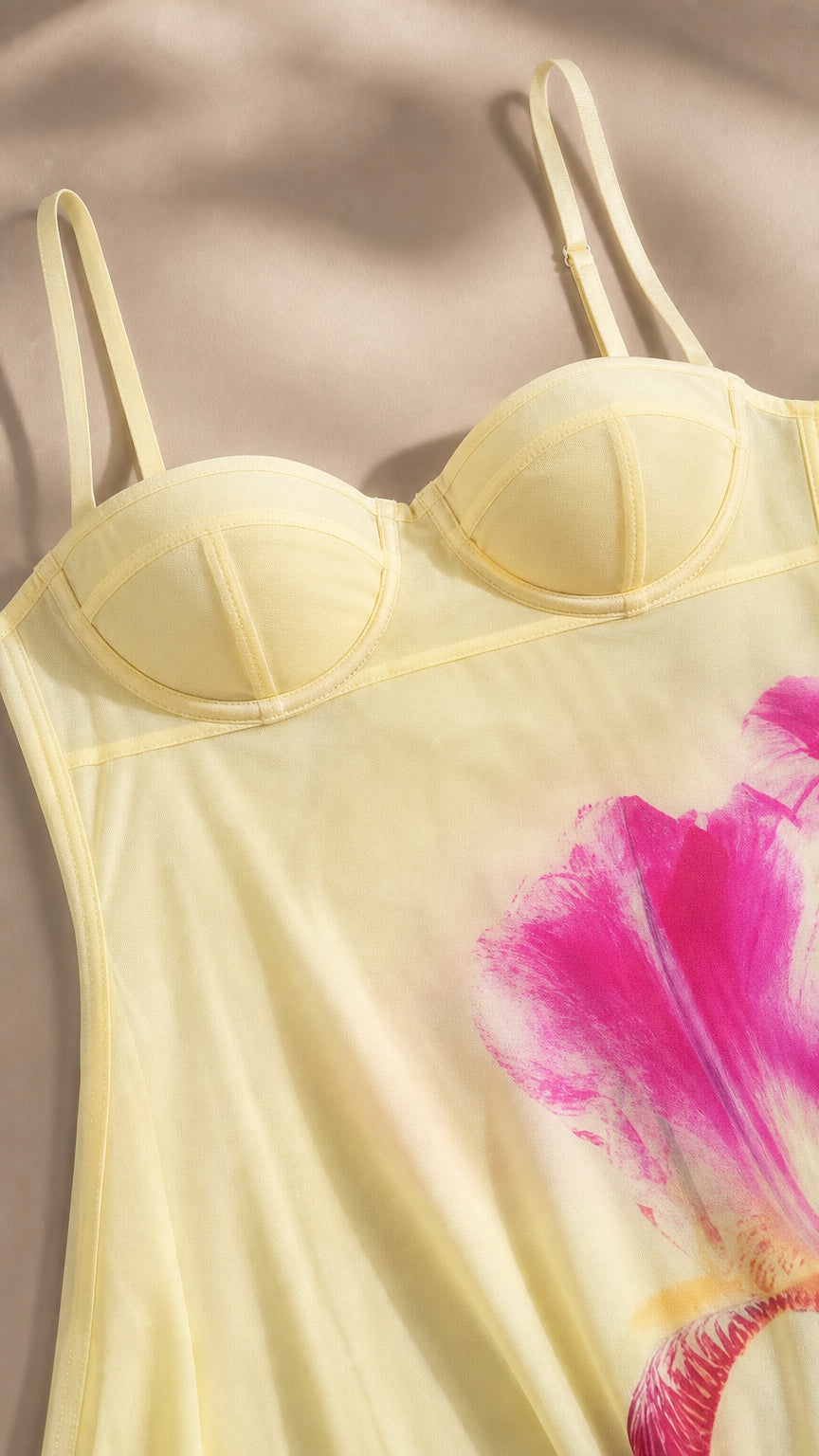 Closeup detail of structured bustier bodice and floral graphic