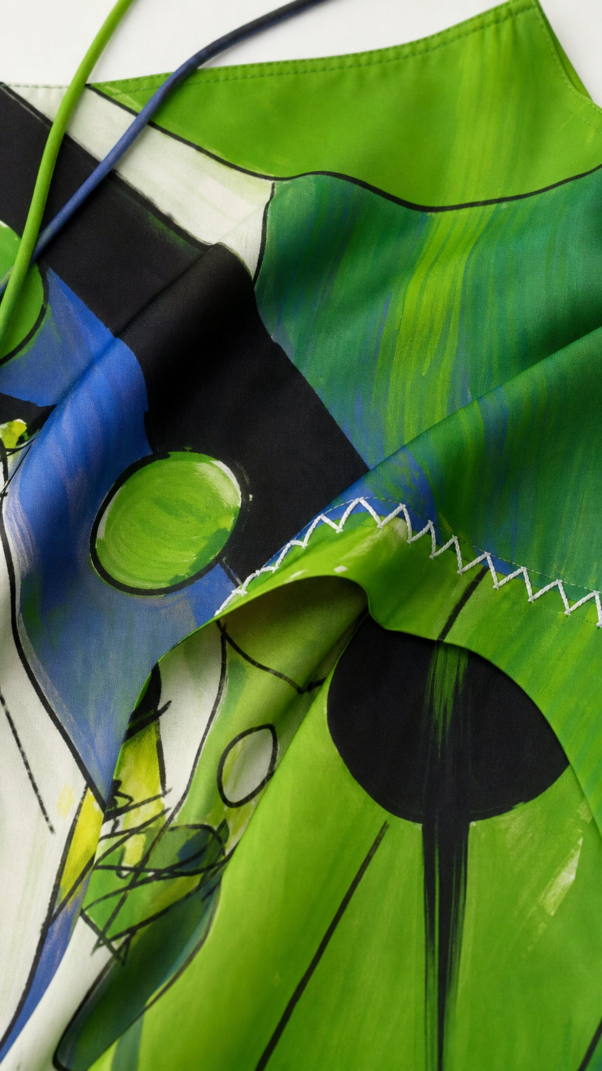 Close-up detail of fabric, print, and contrast stitching