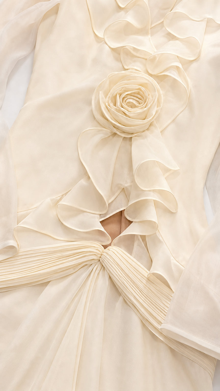 Close-up of 3D rose applique and bodice ruffles