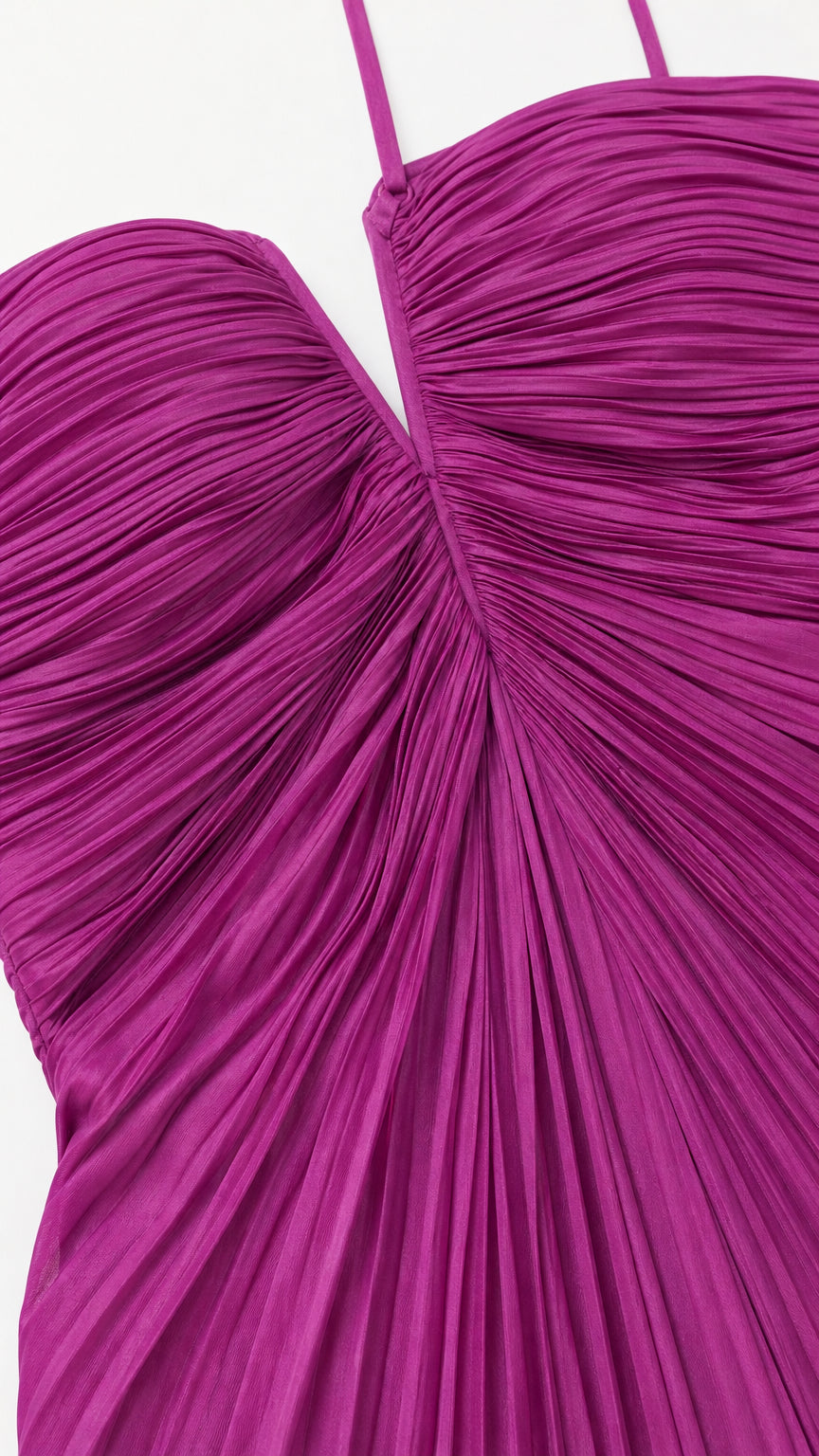 Close-up detail of pleated texture and sweetheart neckline on Fuchsia dress