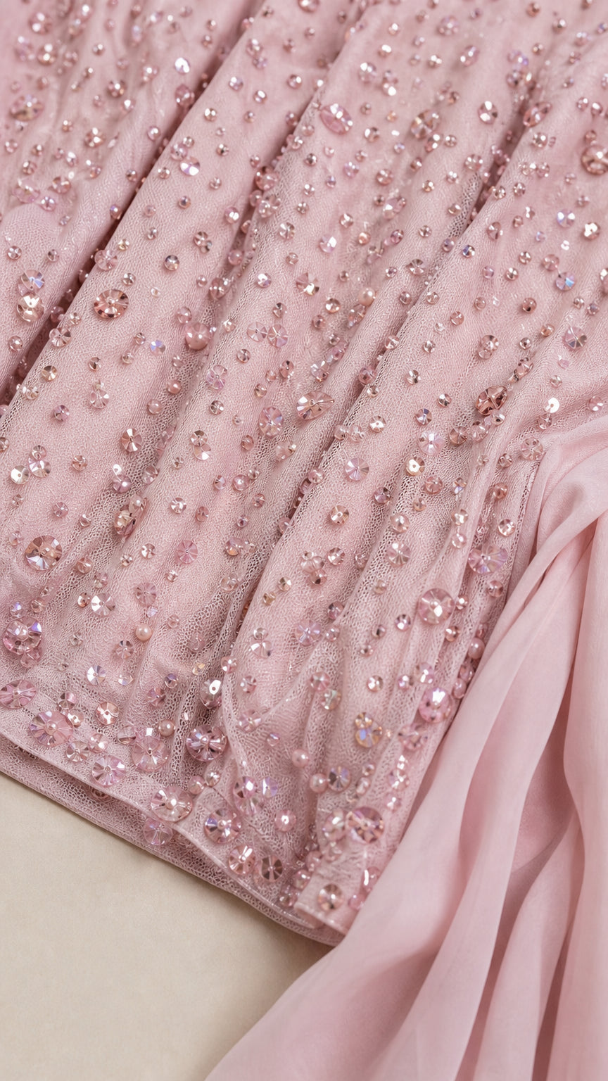 Close-up of pink sequin and bead embellishment details