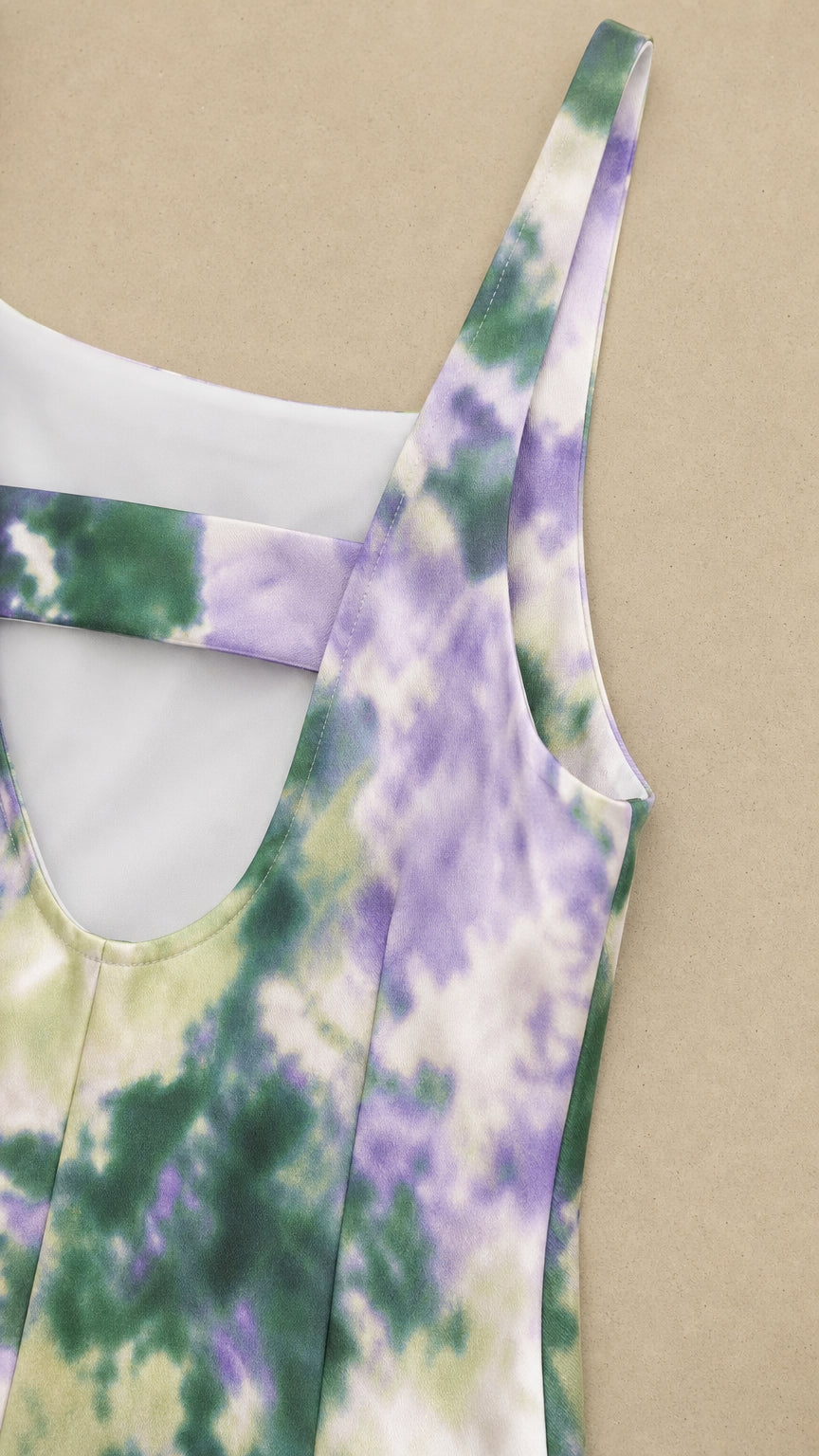 Close-up of fabric texture, straps, and cutout back detail