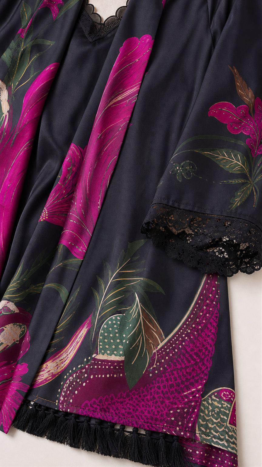 Close-up detail of black floral fabric and lace trim