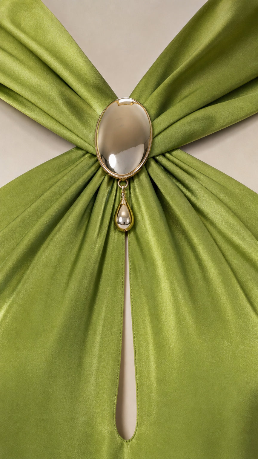 Close-up of gemstone embellished halter neckline and keyhole cutout