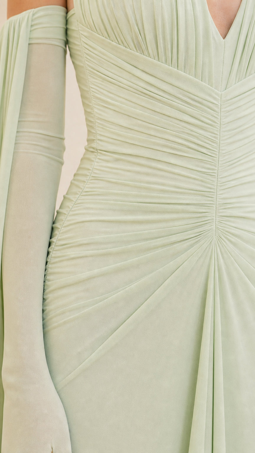 Close-up detail of bodice ruching and fabric texture