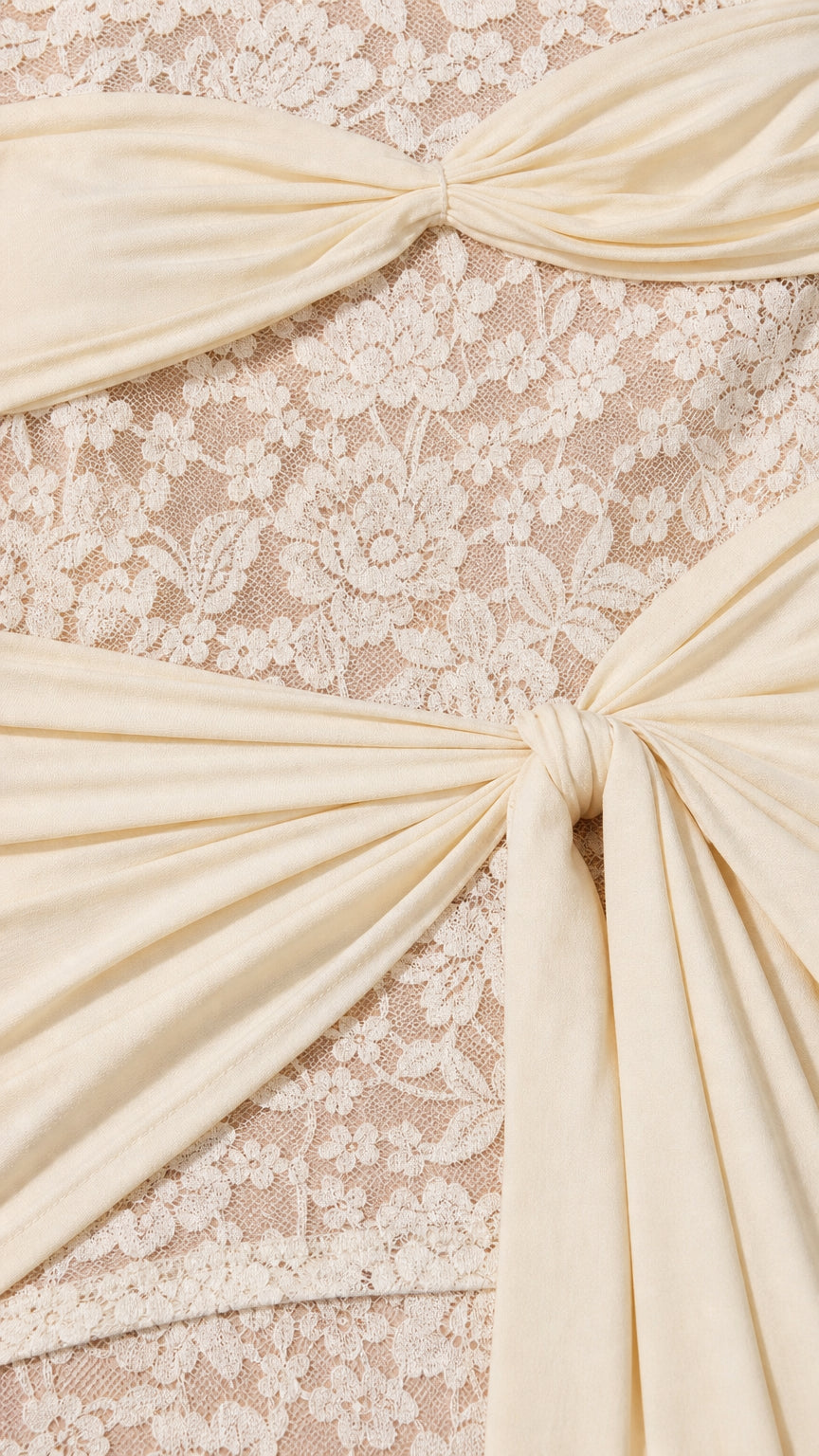 Close-up detail of lace texture and knot drape