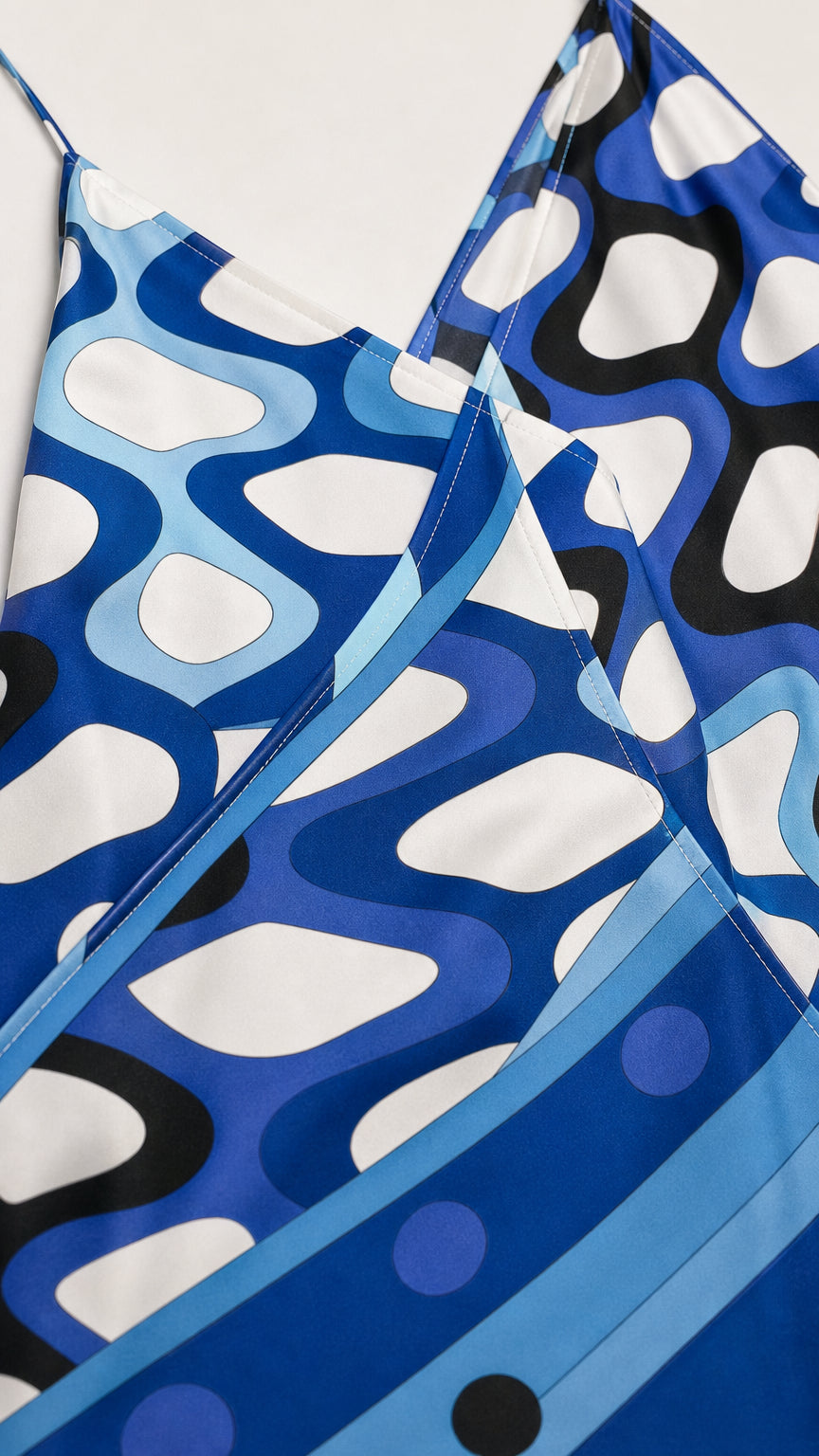 Close-up detail of blue abstract pattern and fabric texture