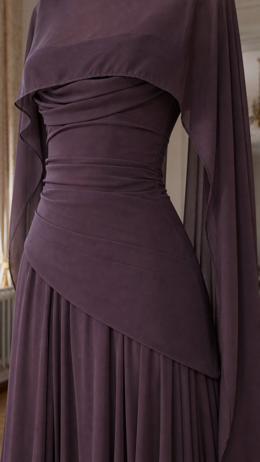 Close-up detail of draped bodice and asymmetrical waist on Plum dress