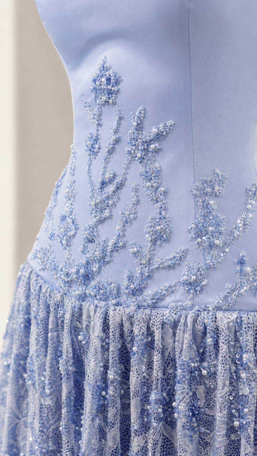 Close-up detail of intricate bead and sequin embroidery