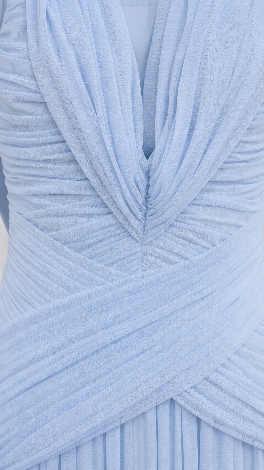 Close-up detail of pleated bodice and V-neckline