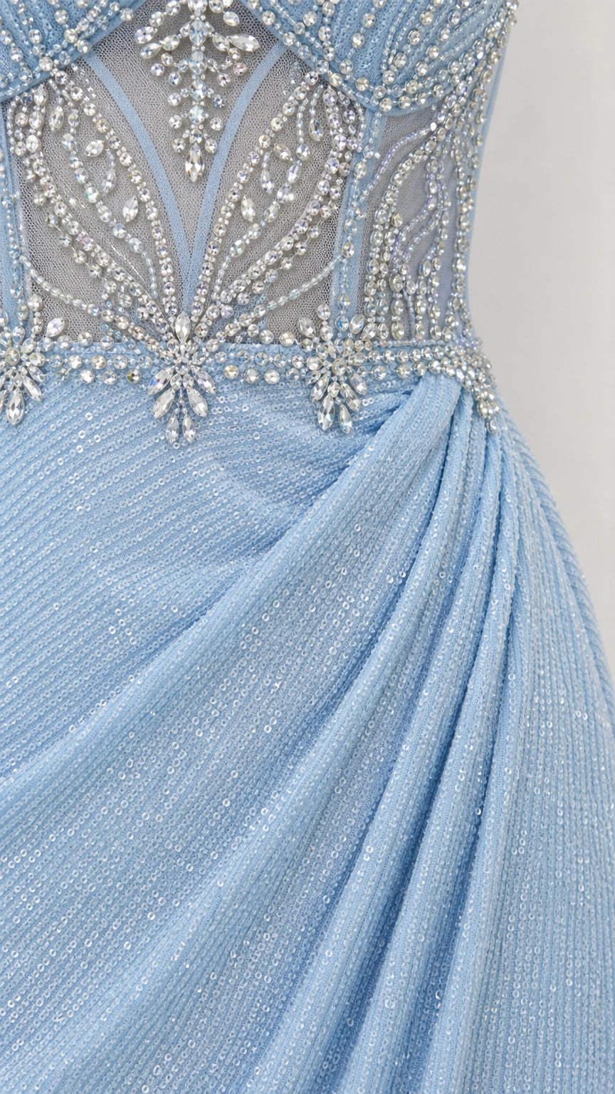 Close-up of intricate beaded bodice and draped waist detail