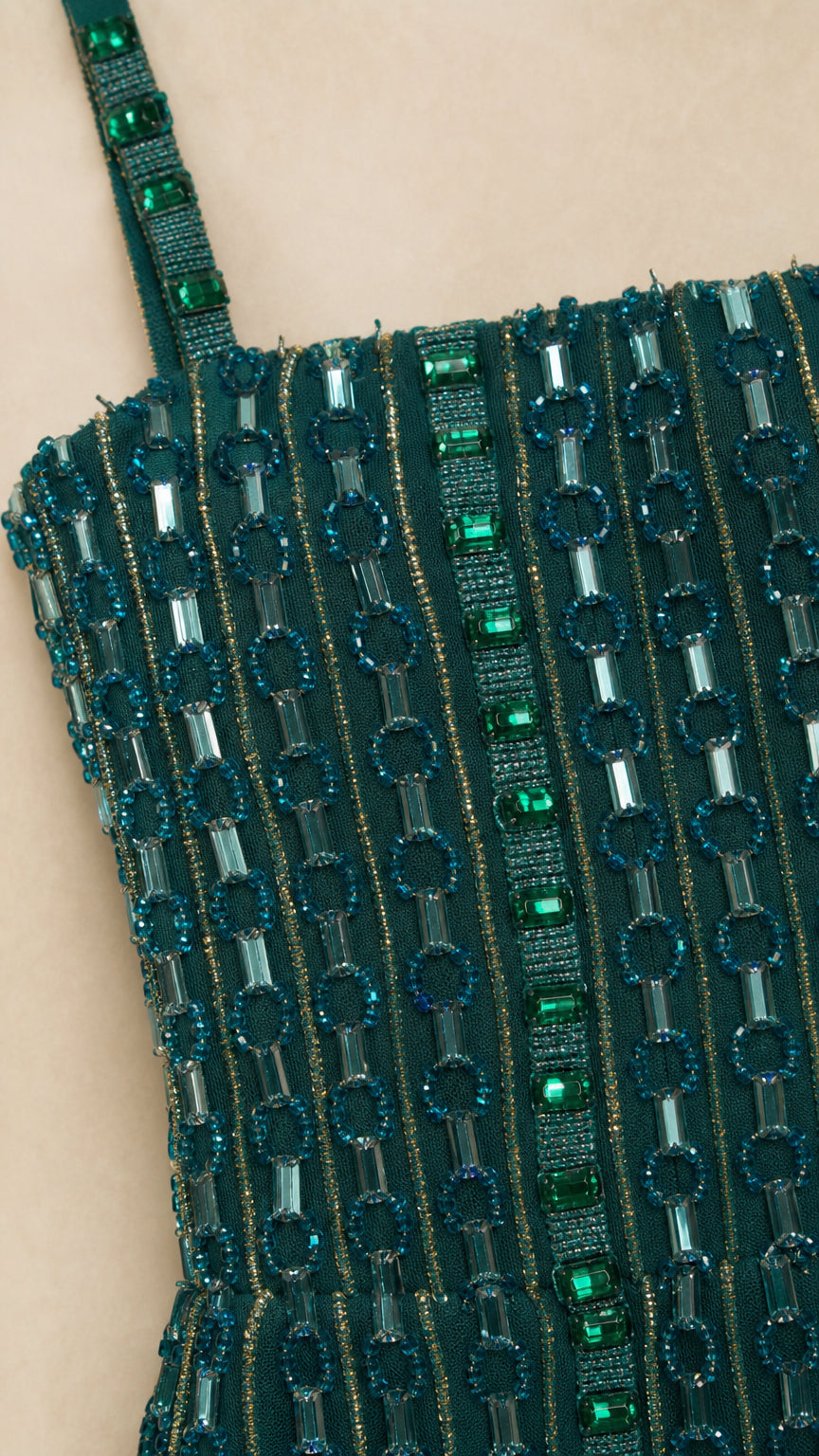 Close-up detail of crystal beadwork and square neckline