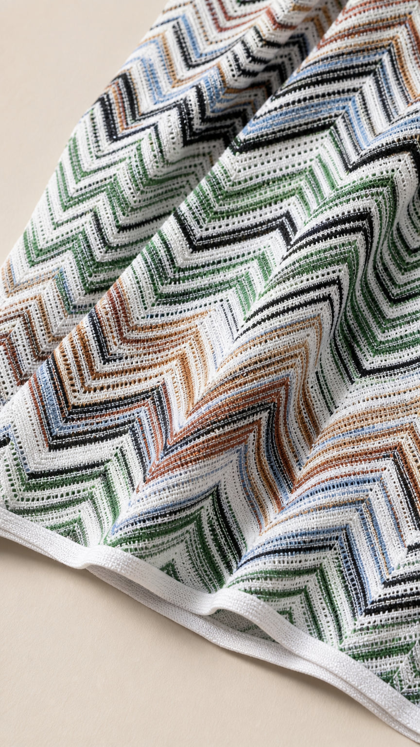 Close-up texture view of multi-color chevron knit fabric