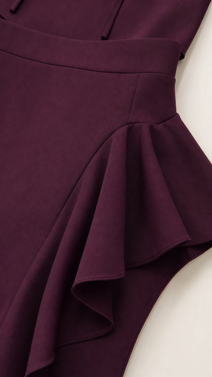 Close-up detail of the Burgundy ruffle skirt construction