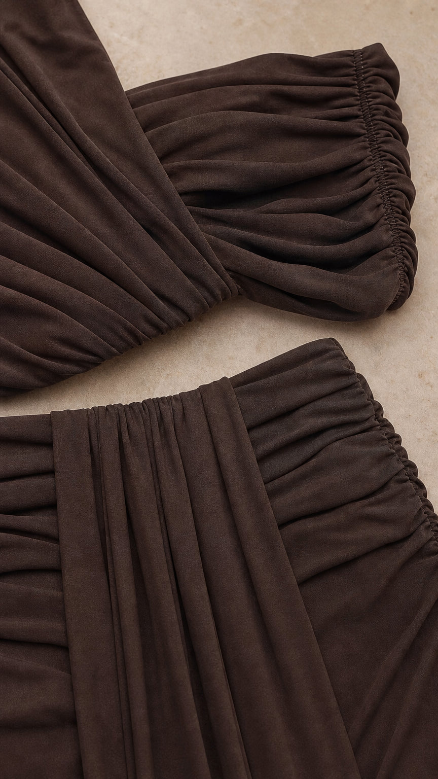 Close-up detail of fabric texture and ruching on the brown set