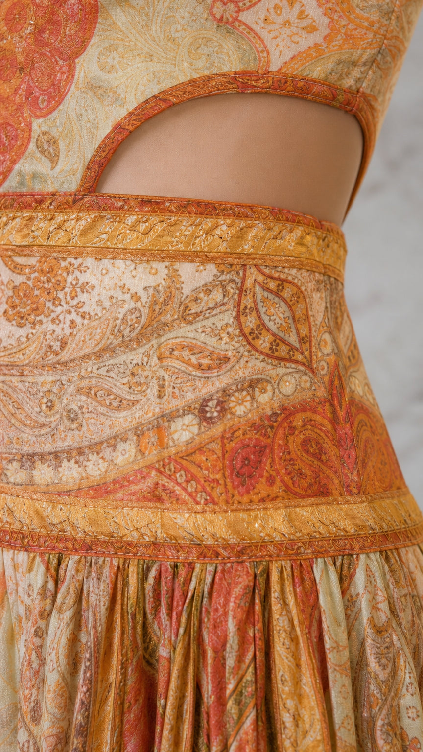 Close-up detail of waist cutout and paisley print