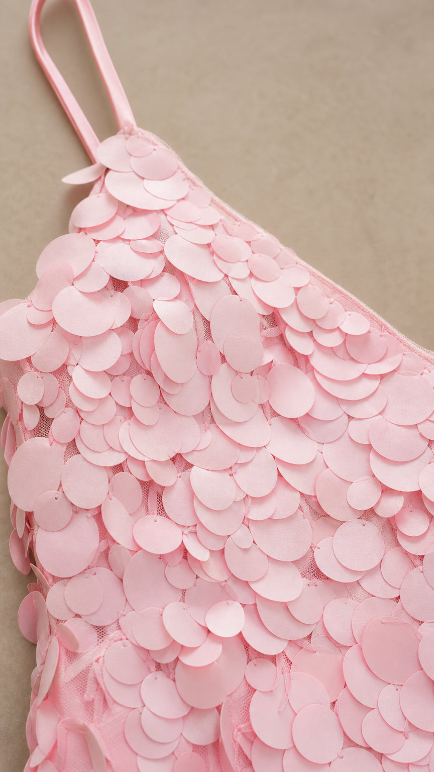 Close-up detail of pink textured 3D petal appliques