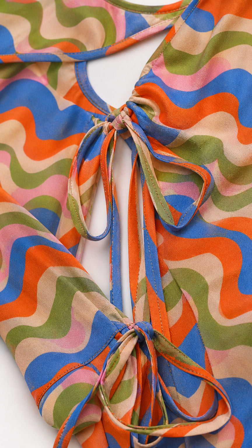 Close-up detail of front cutout and tie cuffs