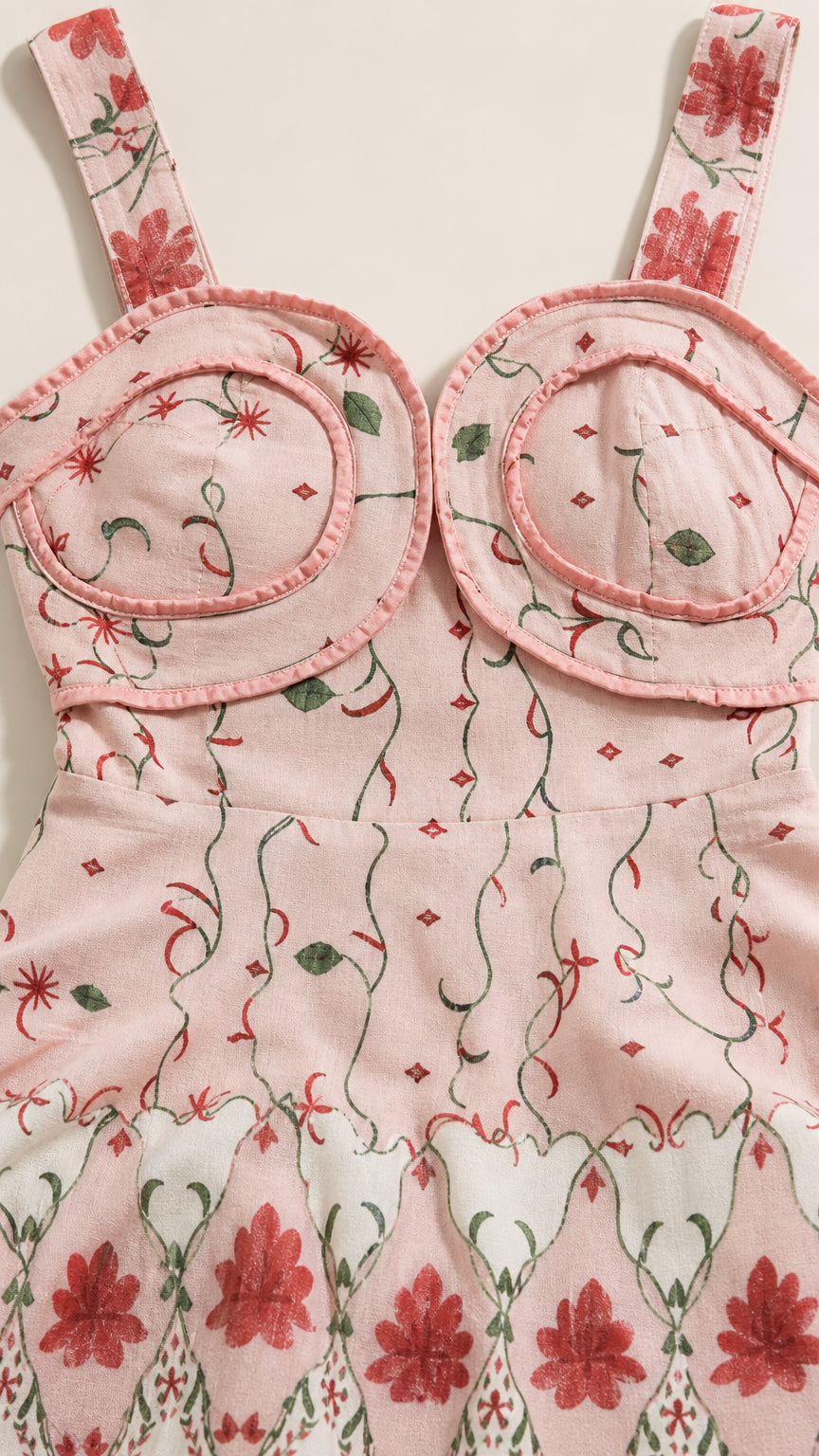 Close-up detail of structured bustier cups and embroidery